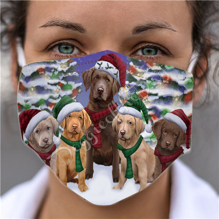 Chesapeake Bay Retriever Dogs Christmas Family Portrait in Holiday Scenic Background Face Mask FM48333