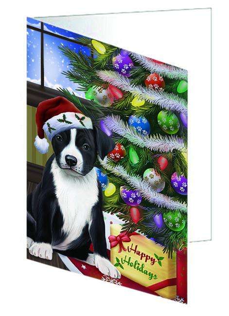Christmas Happy Holidays American Staffordshire Terrier Dog with Tree and Presents Handmade Artwork Assorted Pets Greeting Cards and Note Cards with Envelopes for All Occasions and Holiday Seasons GCD64334