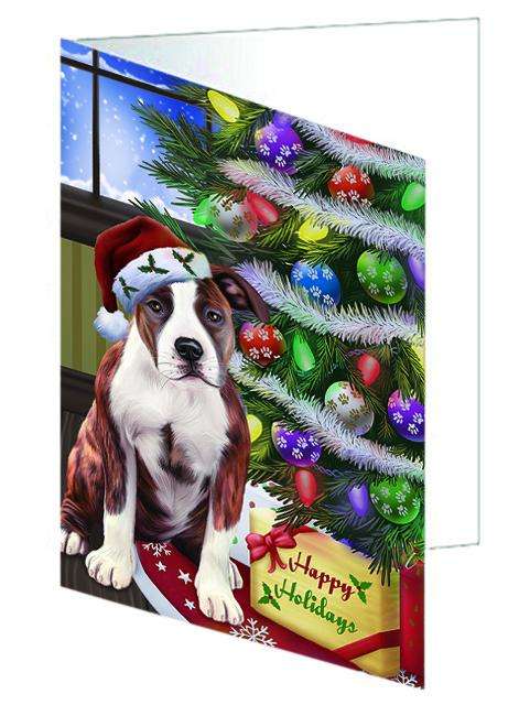 Christmas Happy Holidays American Staffordshire Terrier Dog with Tree and Presents Handmade Artwork Assorted Pets Greeting Cards and Note Cards with Envelopes for All Occasions and Holiday Seasons GCD64337