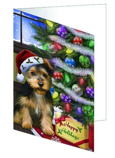 Christmas Happy Holidays Australian Terrier Dog with Tree and Presents Handmade Artwork Assorted Pets Greeting Cards and Note Cards with Envelopes for All Occasions and Holiday Seasons GCD64343