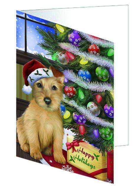 Christmas Happy Holidays Australian Terrier Dog with Tree and Presents Handmade Artwork Assorted Pets Greeting Cards and Note Cards with Envelopes for All Occasions and Holiday Seasons GCD64346