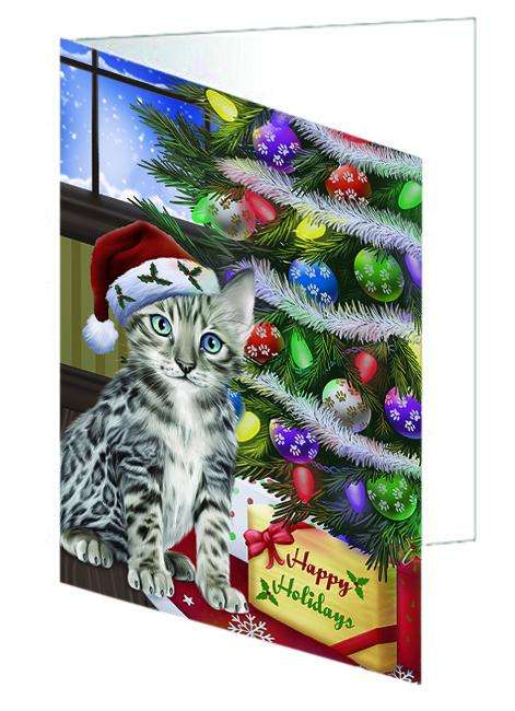 Christmas Happy Holidays Bengal Cat with Tree and Presents Handmade Artwork Assorted Pets Greeting Cards and Note Cards with Envelopes for All Occasions and Holiday Seasons GCD64352