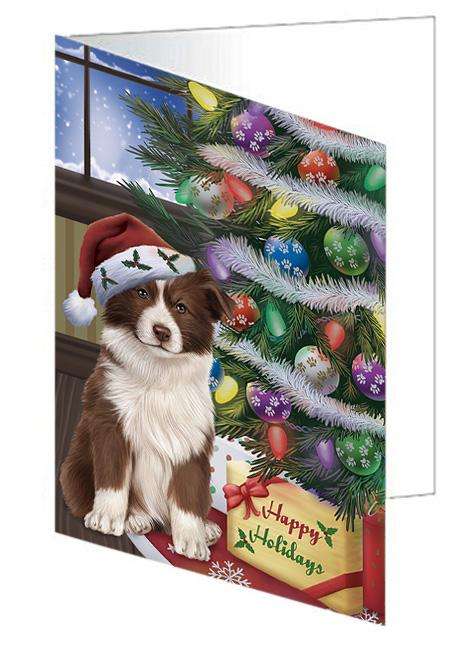 Christmas Happy Holidays Border Collie Dog with Tree and Presents Handmade Artwork Assorted Pets Greeting Cards and Note Cards with Envelopes for All Occasions and Holiday Seasons GCD65441