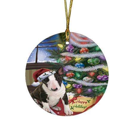 Christmas Happy Holidays Bull Terrier Dog with Tree and Presents Round Flat Christmas Ornament RFPOR53799
