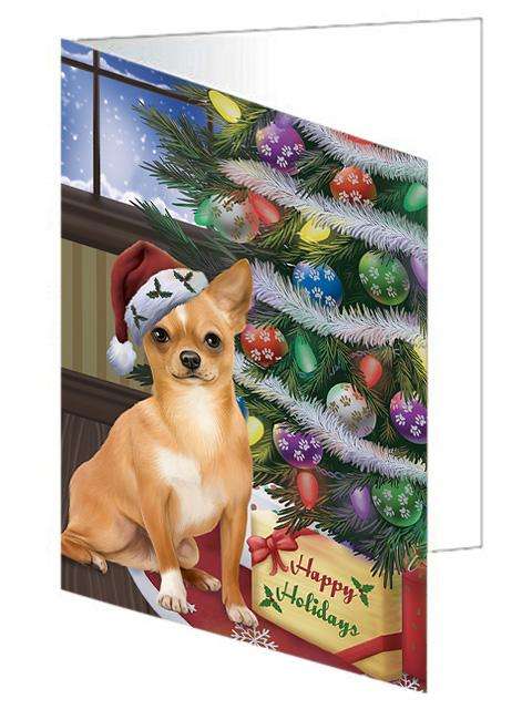 Christmas Happy Holidays Chihuahua Dog with Tree and Presents Handmade Artwork Assorted Pets Greeting Cards and Note Cards with Envelopes for All Occasions and Holiday Seasons GCD65486