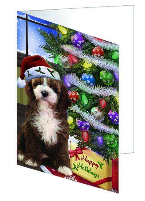 Christmas Happy Holidays Cockapoo Dog with Tree and Presents Handmade Artwork Assorted Pets Greeting Cards and Note Cards with Envelopes for All Occasions and Holiday Seasons GCD64373