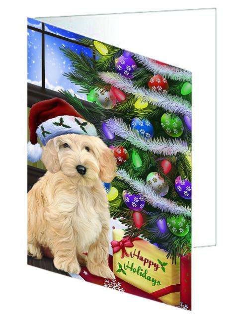 Christmas Happy Holidays Cockapoo Dog with Tree and Presents Handmade Artwork Assorted Pets Greeting Cards and Note Cards with Envelopes for All Occasions and Holiday Seasons GCD64382