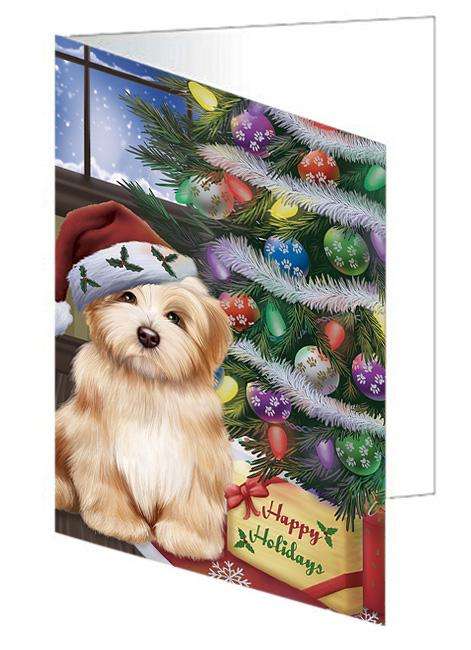 Christmas Happy Holidays Havanese Dog with Tree and Presents Handmade Artwork Assorted Pets Greeting Cards and Note Cards with Envelopes for All Occasions and Holiday Seasons GCD65531
