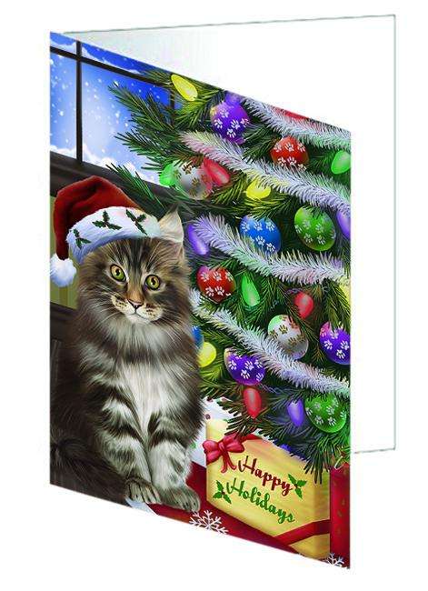 Christmas Happy Holidays Maine Coon Cat with Tree and Presents Handmade Artwork Assorted Pets Greeting Cards and Note Cards with Envelopes for All Occasions and Holiday Seasons GCD64421