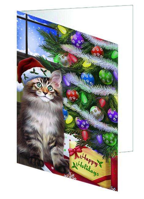 Christmas Happy Holidays Maine Coon Cat with Tree and Presents Handmade Artwork Assorted Pets Greeting Cards and Note Cards with Envelopes for All Occasions and Holiday Seasons GCD64424