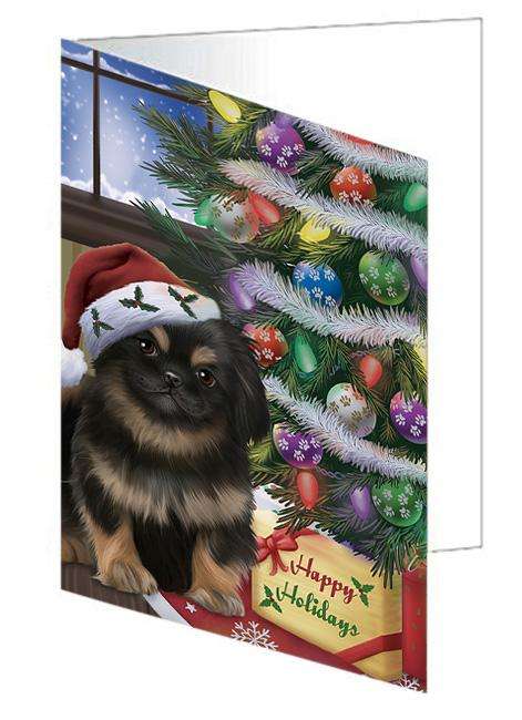 Christmas Happy Holidays Pekingese Dog with Tree and Presents Handmade Artwork Assorted Pets Greeting Cards and Note Cards with Envelopes for All Occasions and Holiday Seasons GCD65555