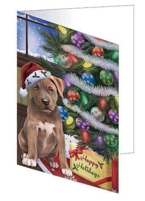 Christmas Happy Holidays Pit Bull Dog with Tree and Presents Handmade Artwork Assorted Pets Greeting Cards and Note Cards with Envelopes for All Occasions and Holiday Seasons GCD65558