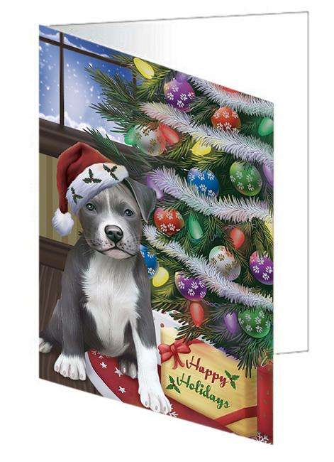 Christmas Happy Holidays Pit Bull Dog with Tree and Presents Handmade Artwork Assorted Pets Greeting Cards and Note Cards with Envelopes for All Occasions and Holiday Seasons GCD65561