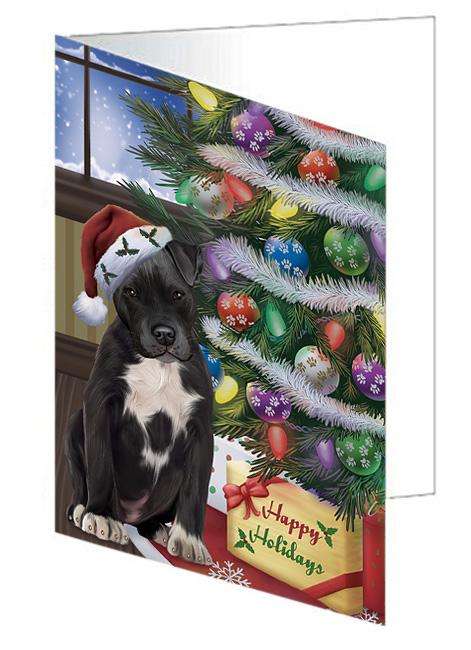 Christmas Happy Holidays Pit Bull Dog with Tree and Presents Handmade Artwork Assorted Pets Greeting Cards and Note Cards with Envelopes for All Occasions and Holiday Seasons GCD65564