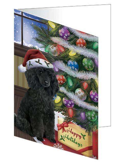 Christmas Happy Holidays Poodle Dog with Tree and Presents Handmade Artwork Assorted Pets Greeting Cards and Note Cards with Envelopes for All Occasions and Holiday Seasons GCD65582