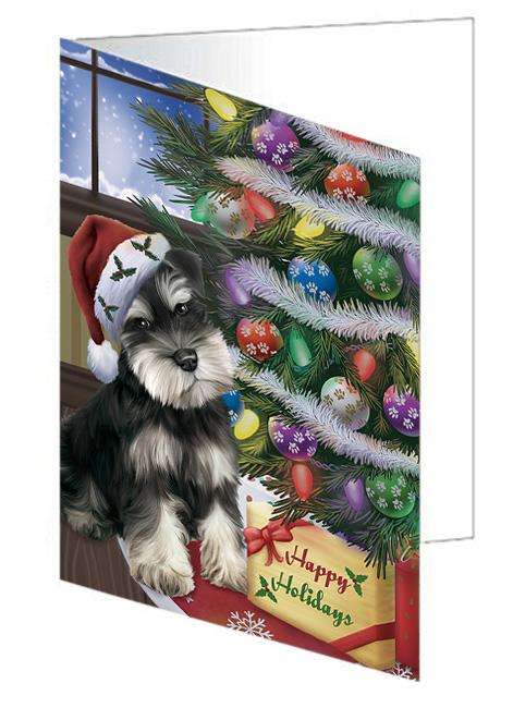Christmas Happy Holidays Schnauzer Dog with Tree and Presents Handmade Artwork Assorted Pets Greeting Cards and Note Cards with Envelopes for All Occasions and Holiday Seasons GCD65588