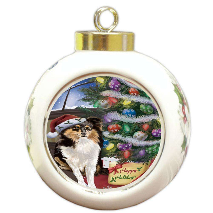 Christmas Happy Holidays Shetland Sheepdog with Tree and Presents Round Ball Christmas Ornament RBPOR53859