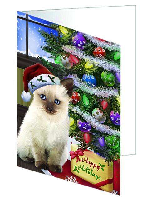 Christmas Happy Holidays Siamese Cat with Tree and Presents Handmade Artwork Assorted Pets Greeting Cards and Note Cards with Envelopes for All Occasions and Holiday Seasons GCD64442