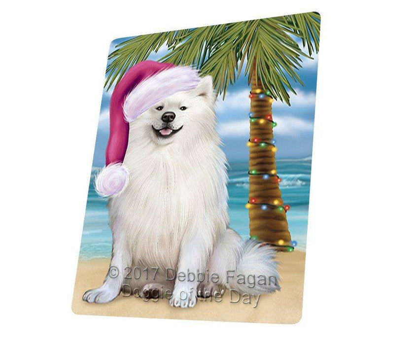 Christmas Happy Holidays Summer Time American Eskimo Adult Dog on Beach Wearing Santa Hat Cutting Board CUTB411