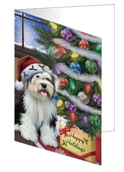 Christmas Happy Holidays Tibetan Terrier Dog with Tree and Presents Handmade Artwork Assorted Pets Greeting Cards and Note Cards with Envelopes for All Occasions and Holiday Seasons GCD65630