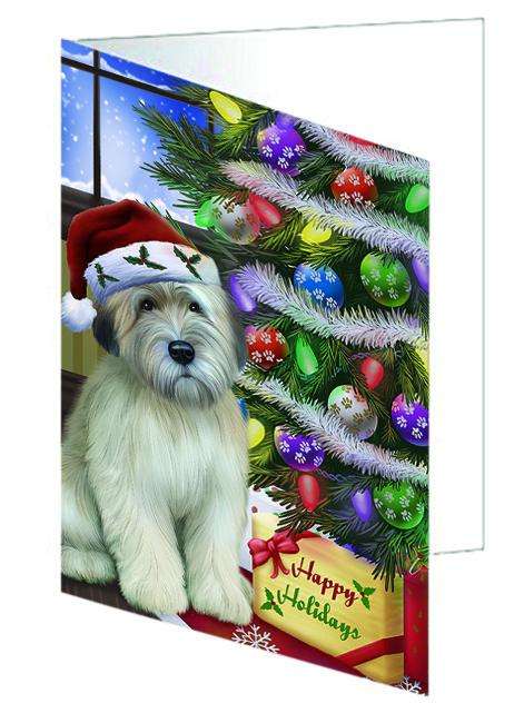 Christmas Happy Holidays Wheaten Terrier Dog with Tree and Presents Handmade Artwork Assorted Pets Greeting Cards and Note Cards with Envelopes for All Occasions and Holiday Seasons GCD64460