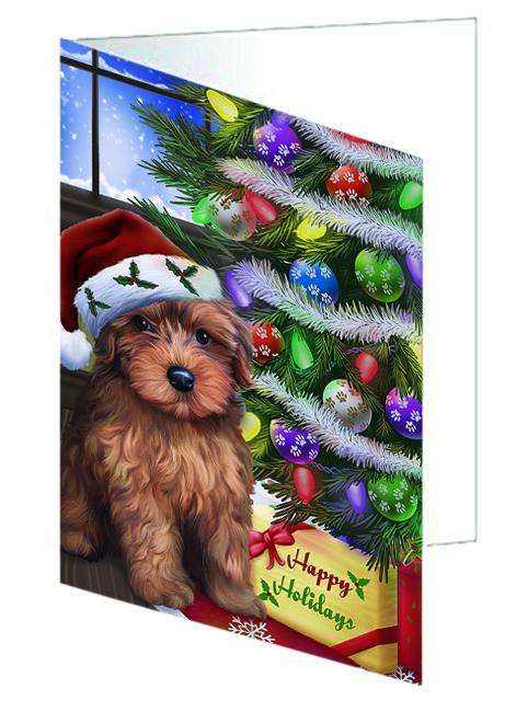 Christmas Happy Holidays Yorkipoo Dog with Tree and Presents Handmade Artwork Assorted Pets Greeting Cards and Note Cards with Envelopes for All Occasions and Holiday Seasons GCD64475