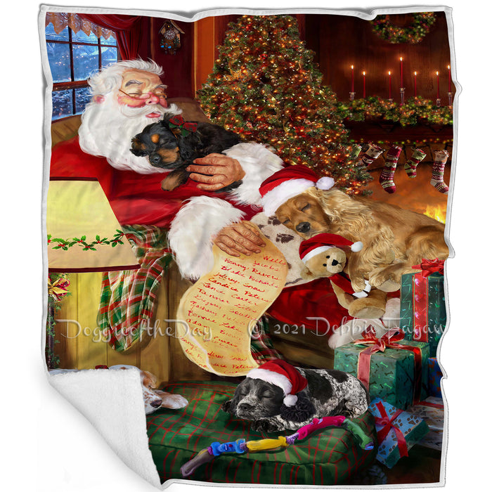 Cocker Spaniel Dog and Puppies Sleeping with Santa Blanket