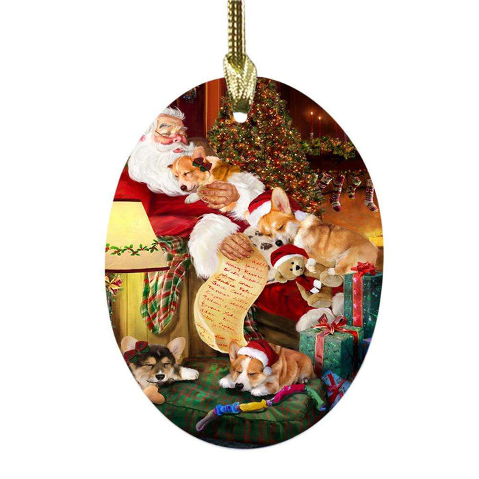 Corgis Dog and Puppies Sleeping with Santa Oval Glass Christmas Ornament OGOR49272