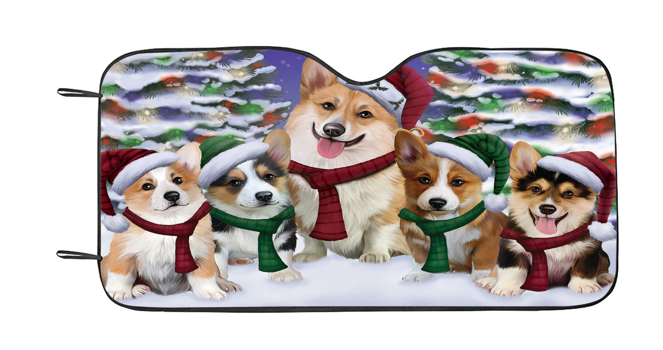 Corgi Dogs Christmas Family Portrait in Holiday Scenic Background Car Sun Shade