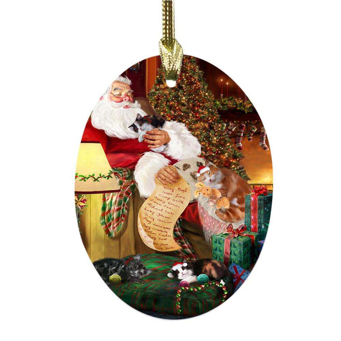 Cymric Black And White Cats and Kittens Sleeping with Santa Oval Glass Christmas Ornament OGOR49274