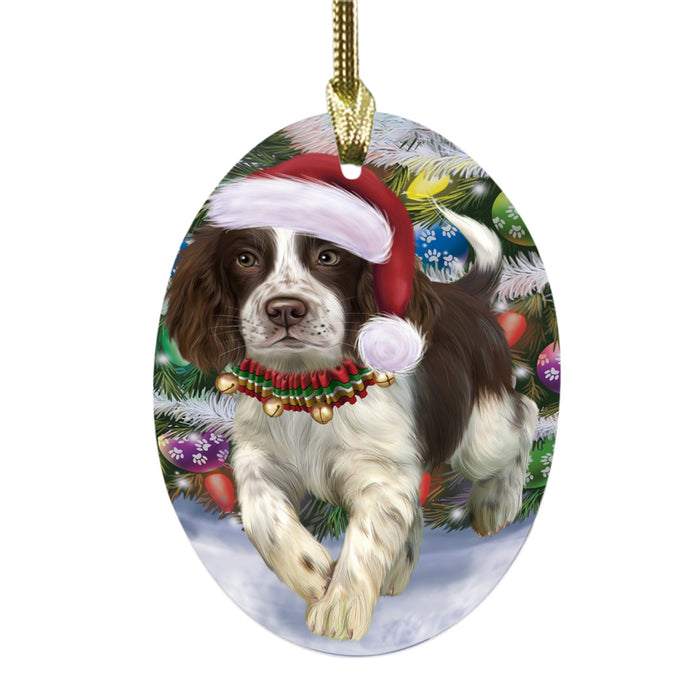 Trotting in the Snow English Springer Spaniel Dog Oval Glass Christmas Ornament OGOR49441