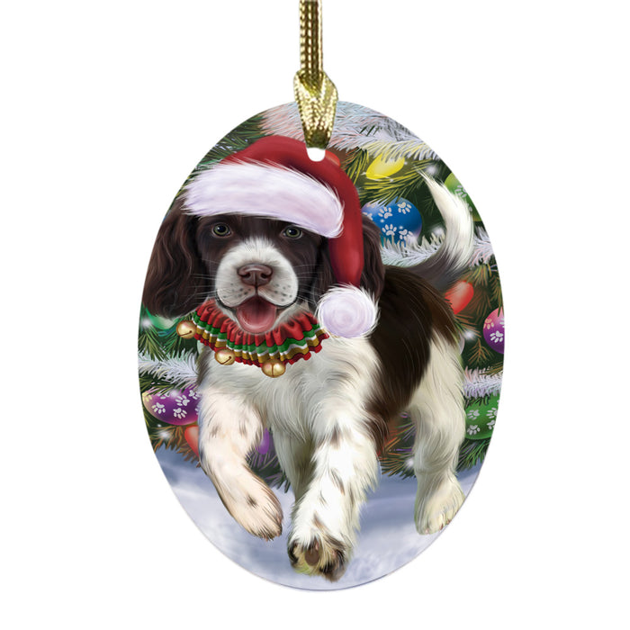 Trotting in the Snow English Springer Spaniel Dog Oval Glass Christmas Ornament OGOR49442