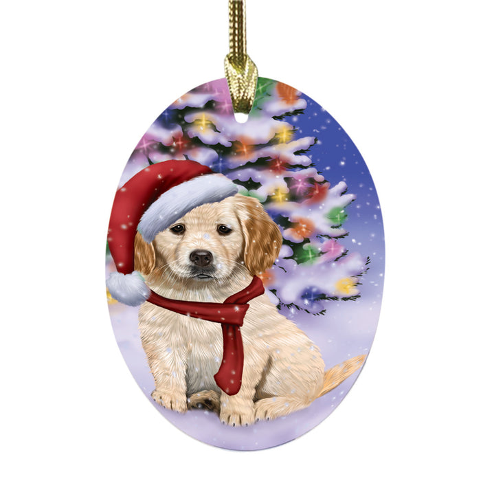 Winterland Wonderland Golden Retriever Dog In Christmas Holiday Scenic Background Oval Glass Christmas Ornament OGOR49577