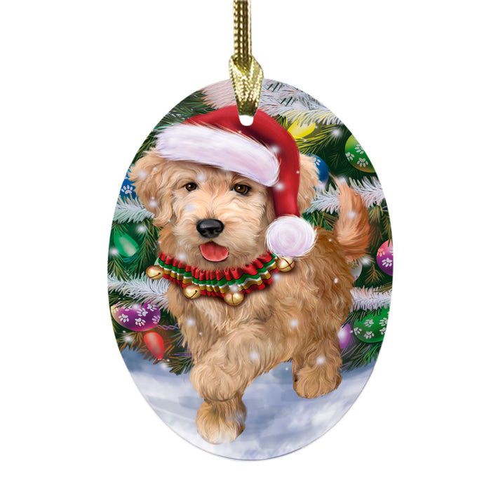 Trotting in the Snow Goldendoodle Dog Oval Glass Christmas Ornament OGOR49448