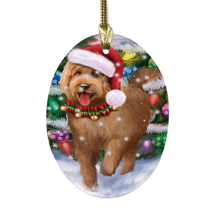 Trotting in the Snow Goldendoodle Dog Oval Glass Christmas Ornament OGOR49450