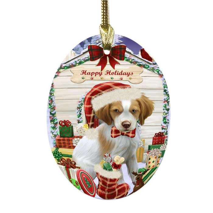 Happy Holidays Christmas Brittany Spaniel House With Presents Oval Glass Christmas Ornament OGOR49812