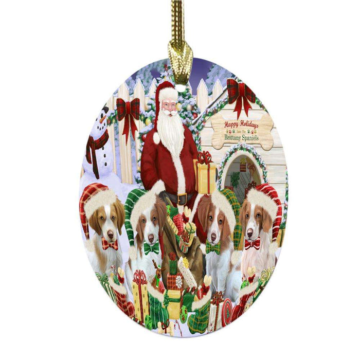 Happy Holidays Christmas Brittany Spaniels Dog House Gathering Oval Glass Christmas Ornament OGOR49689