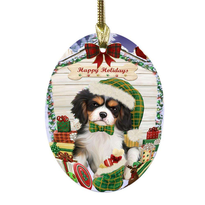 Happy Holidays Christmas Cavalier King Charles Spaniel House With Presents Oval Glass Christmas Ornament OGOR49830