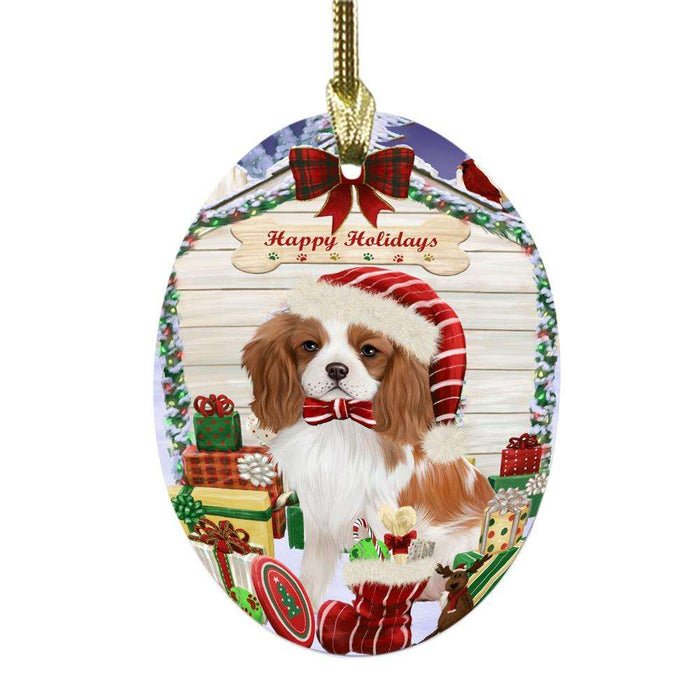 Happy Holidays Christmas Cavalier King Charles Spaniel House With Presents Oval Glass Christmas Ornament OGOR49833