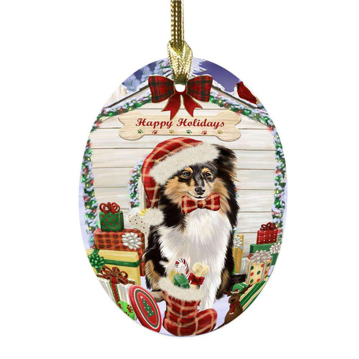 Happy Holidays Christmas Shetland Sheepdog House With Presents Oval Glass Christmas Ornament OGOR49960