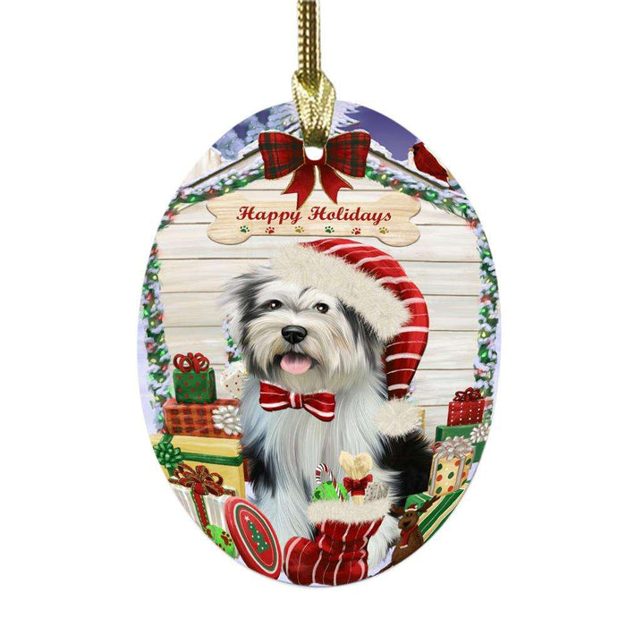 Happy Holidays Christmas Tibetan Terrier House With Presents Oval Glass Christmas Ornament OGOR49981