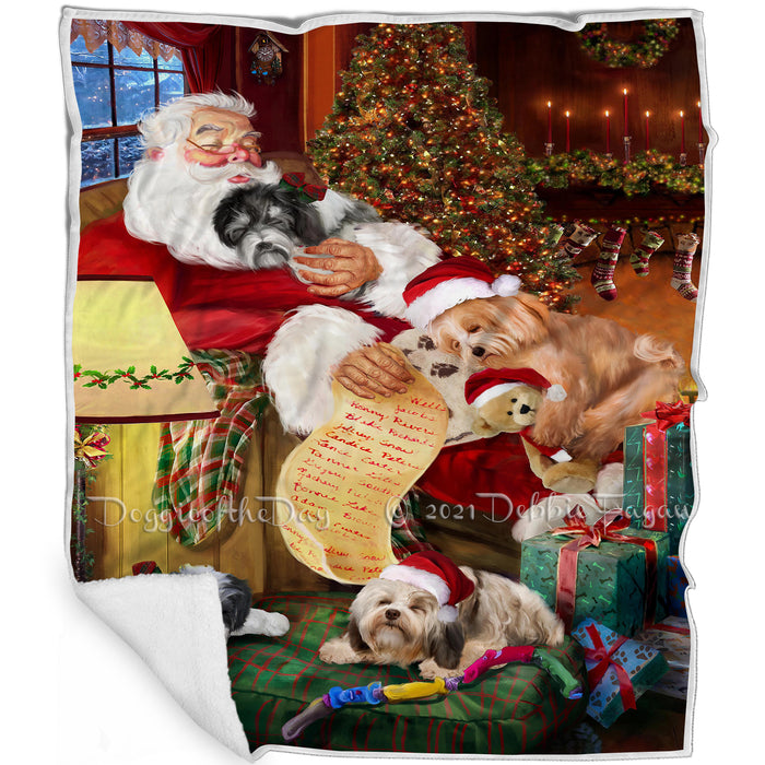 Havanese Dog and Puppies Sleeping with Santa Blanket