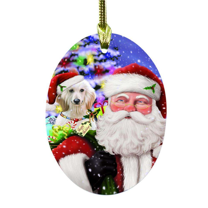 Jolly Old Saint Nick Santa Holding Afghan Hound Dog and Happy Holiday Gifts Oval Glass Christmas Ornament OGOR48789
