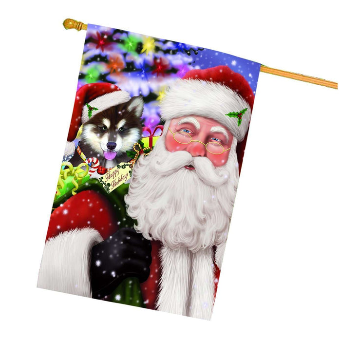 Jolly Old Saint Nick Santa Holding Alaskan Malamute Dog and Happy Holiday Gifts House Flag