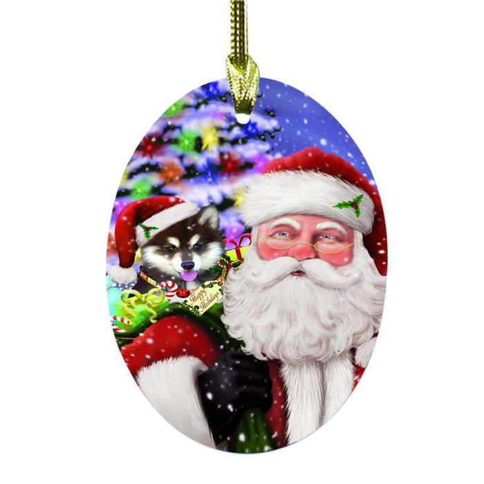 Jolly Old Saint Nick Santa Holding Alaskan Malamute Dog and Happy Holiday Gifts Oval Glass Christmas Ornament OGOR48794