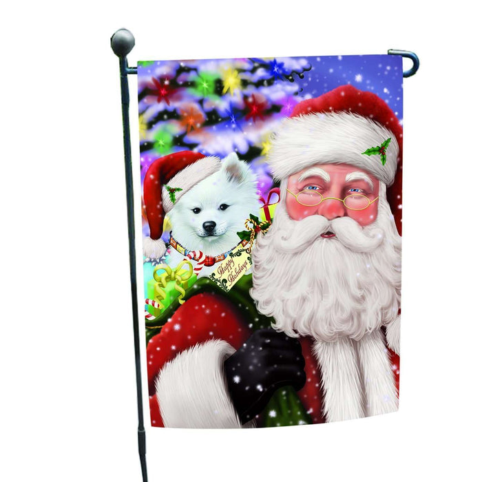 Jolly Old Saint Nick Santa Holding American Eskimo Dog and Happy Holiday Gifts Garden Flag
