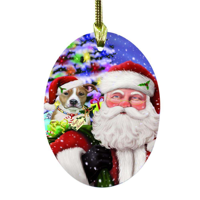 Jolly Old Saint Nick Santa Holding American Staffordshire Dog and Happy Holiday Gifts Oval Glass Christmas Ornament OGOR48796