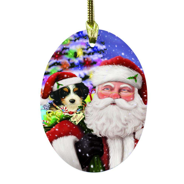 Jolly Old Saint Nick Santa Holding Bernedoodle Dog and Happy Holiday Gifts Oval Glass Christmas Ornament OGOR48816