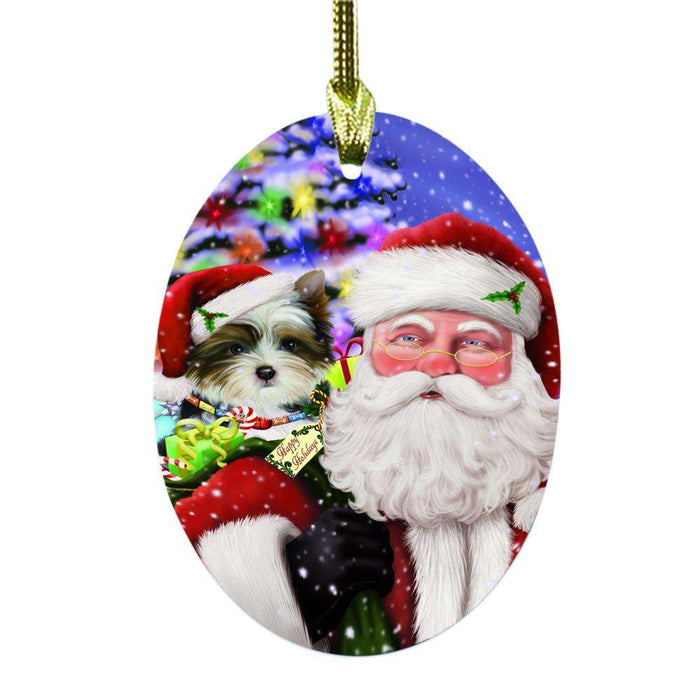 Jolly Old Saint Nick Santa Holding Biewer Dog and Happy Holiday Gifts Oval Glass Christmas Ornament OGOR48819
