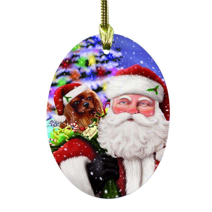 Jolly Old Saint Nick Santa Holding Cavalier King Charles Spaniel Dog and Happy Holiday Gifts Oval Glass Christmas Ornament OGOR48833
